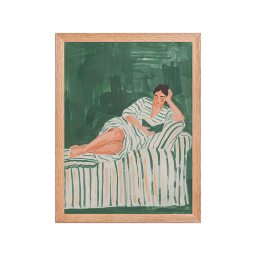 Reading on the Sofa Framed Art Print