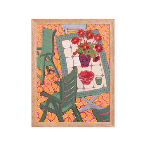 Garden Table with Red Daisies Framed Art Print